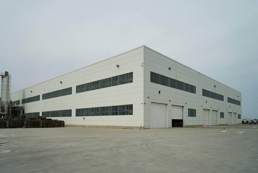 Exterior of a large factory in an industrial sector in Drummondville.