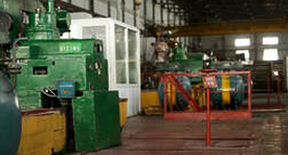 Machinerie industrielle peint d'un vert forêt par Peintre Drummondville.  